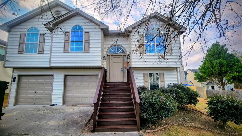 2520 Carolina Ridge Riverdale, GA 30296 - Photo 1 of 1 a front view of a house with a yard