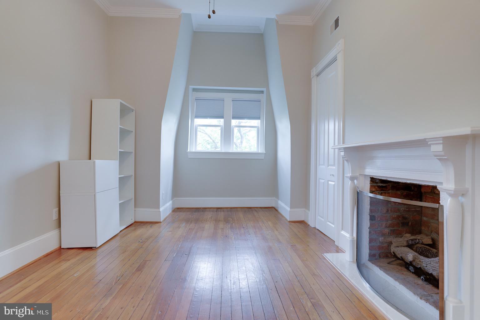 711 Massachusetts Avenue Northeast Washington, DC 20002 - Photo 42 of 68 Cathedral ceilings a highlight of top floor bdroom