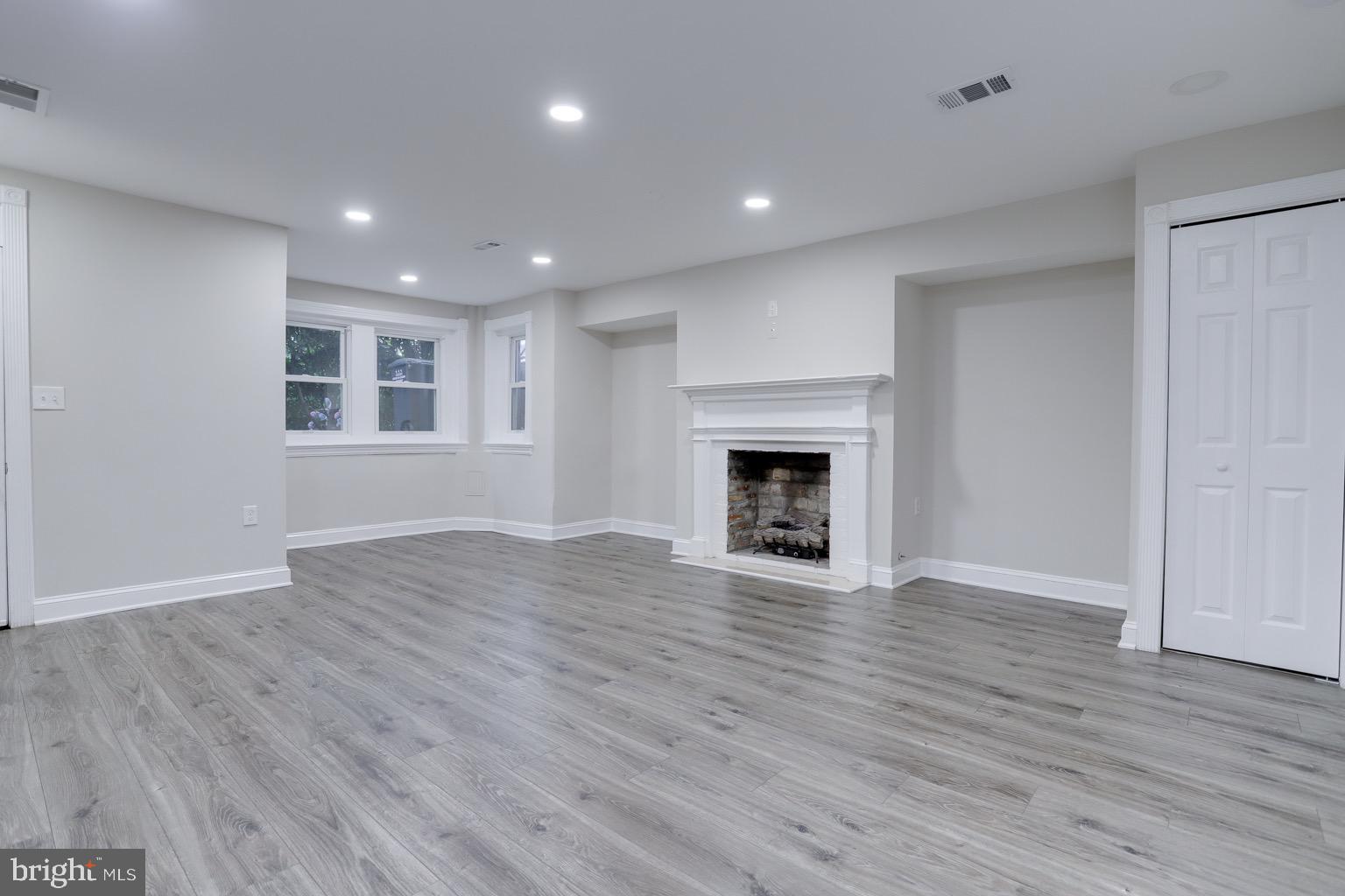 711 Massachusetts Avenue Northeast Washington, DC 20002 - Photo 55 of 68 Basement features a fireplace