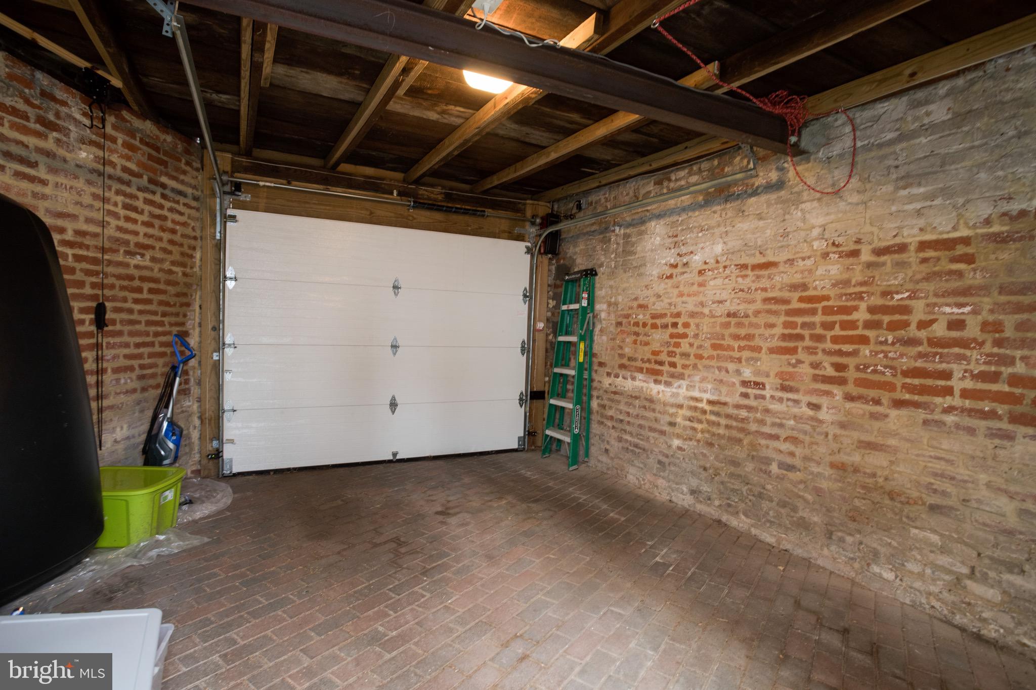 711 Massachusetts Avenue Northeast Washington, DC 20002 - Photo 68 of 68 Large garage features room for a car & storage