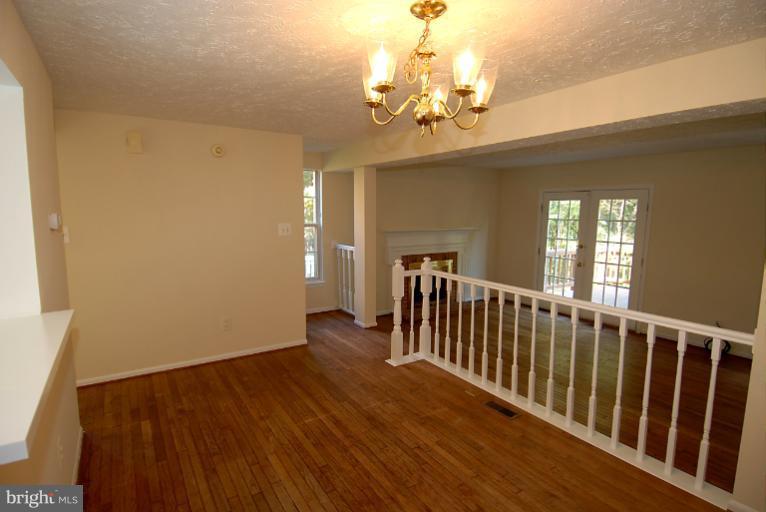 1489 Autumn Ridge Circle Reston, VA 20194 - Photo 11 of 23 a view of a livingroom with wooden floor
