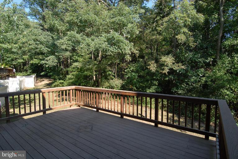 1489 Autumn Ridge Circle Reston, VA 20194 - Photo 17 of 23 a view of balcony with wooden floor