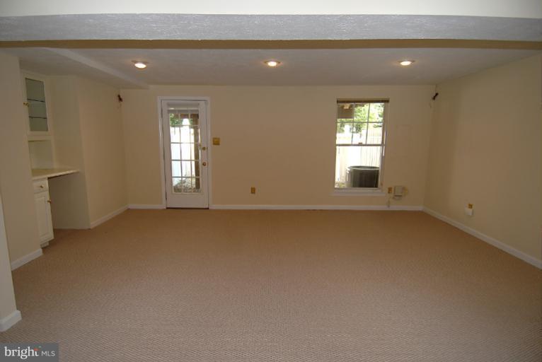 1489 Autumn Ridge Circle Reston, VA 20194 - Photo 19 of 23 a view of an empty room with a window