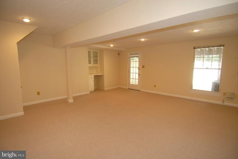 1489 Autumn Ridge Circle Reston, VA 20194 - Photo 3 of 23 a view of an empty room with a window