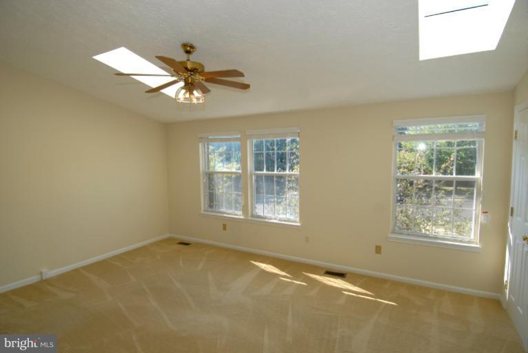 1489 Autumn Ridge Circle Reston, VA 20194 - Photo 21 of 23 a view of an empty room with a window
