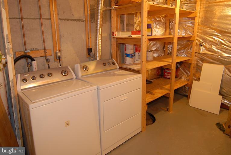 1489 Autumn Ridge Circle Reston, VA 20194 - Photo 22 of 23 a utility room with dryer and washer