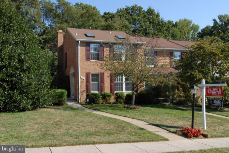 1489 Autumn Ridge Circle Reston, VA 20194 - Photo 23 of 23 a front view of a house with garden