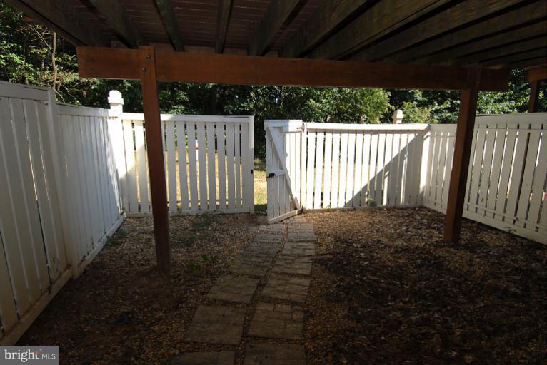 1489 Autumn Ridge Circle Reston, VA 20194 - Photo 4 of 23 a view of backyard with green space