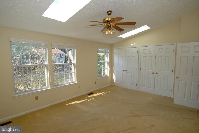 1489 Autumn Ridge Circle Reston, VA 20194 - Photo 9 of 23 a view of an empty room with a window