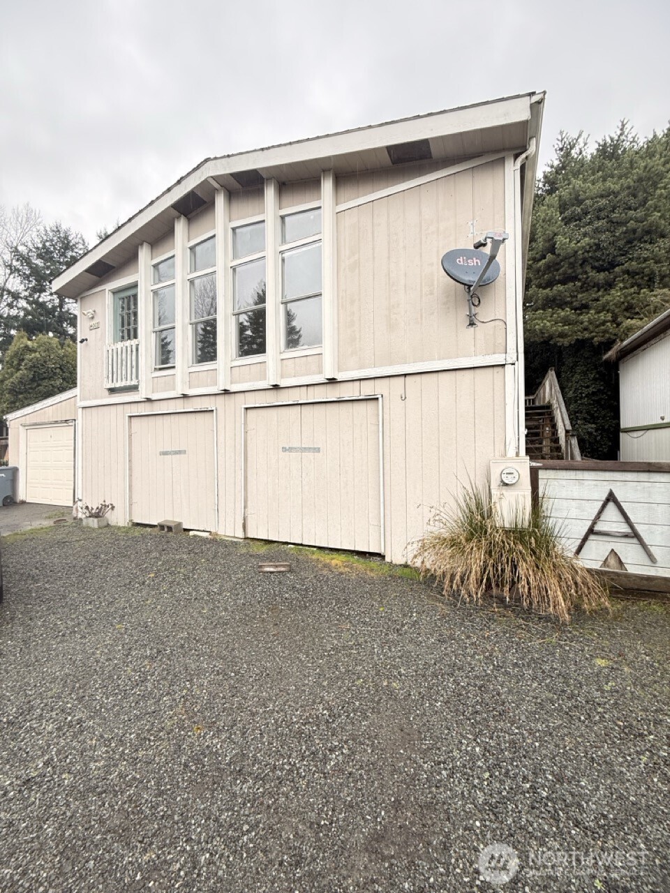 14003 70th Street East Sumner, WA 98390 - Photo 2 of 20 a front view of a house with a yard