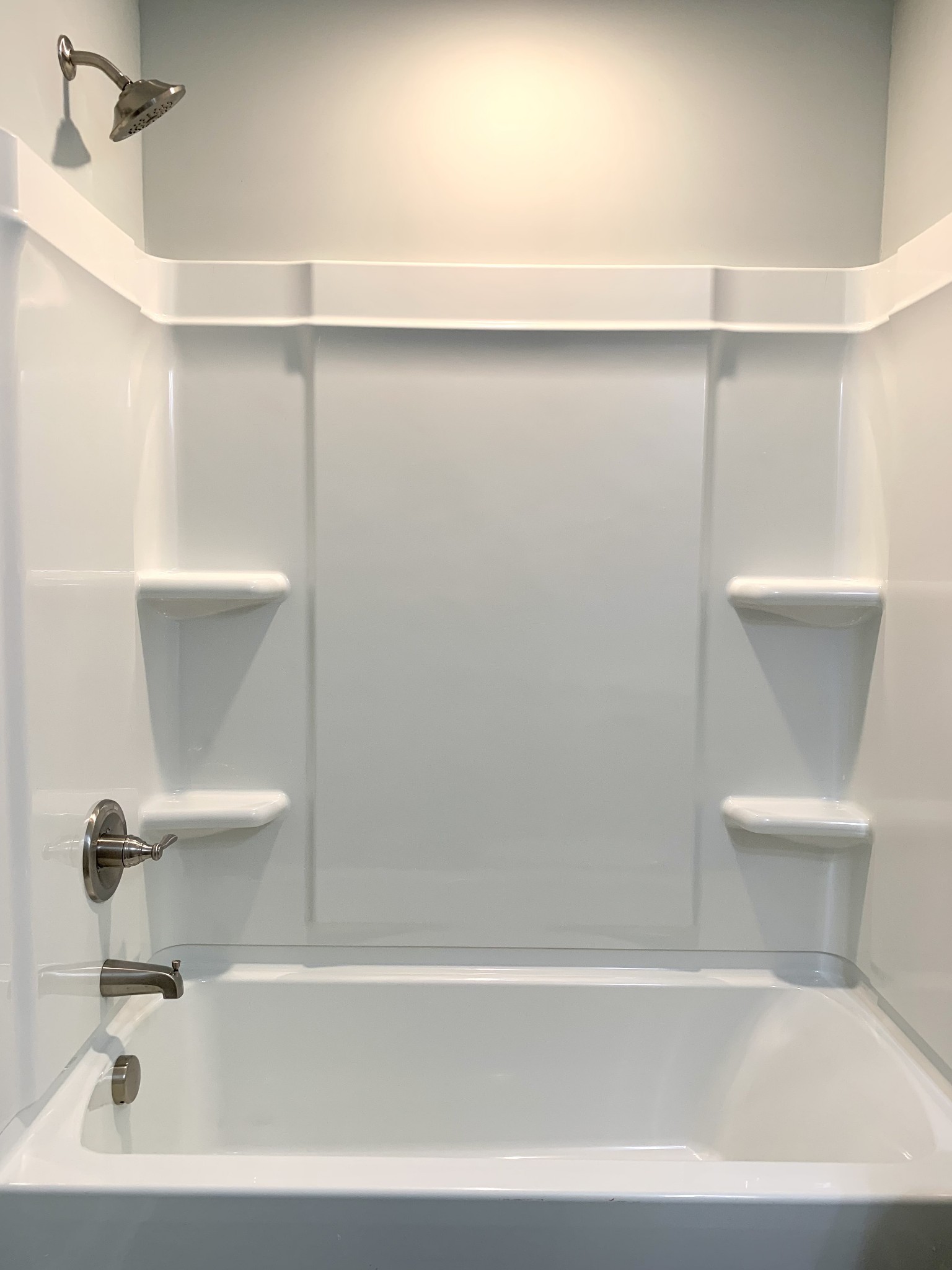 915 Sinclair Drive, Unit 103 Clarksville, TN 37042 - Photo 28 of 31 a bathroom with a white bath tub and a white toilet