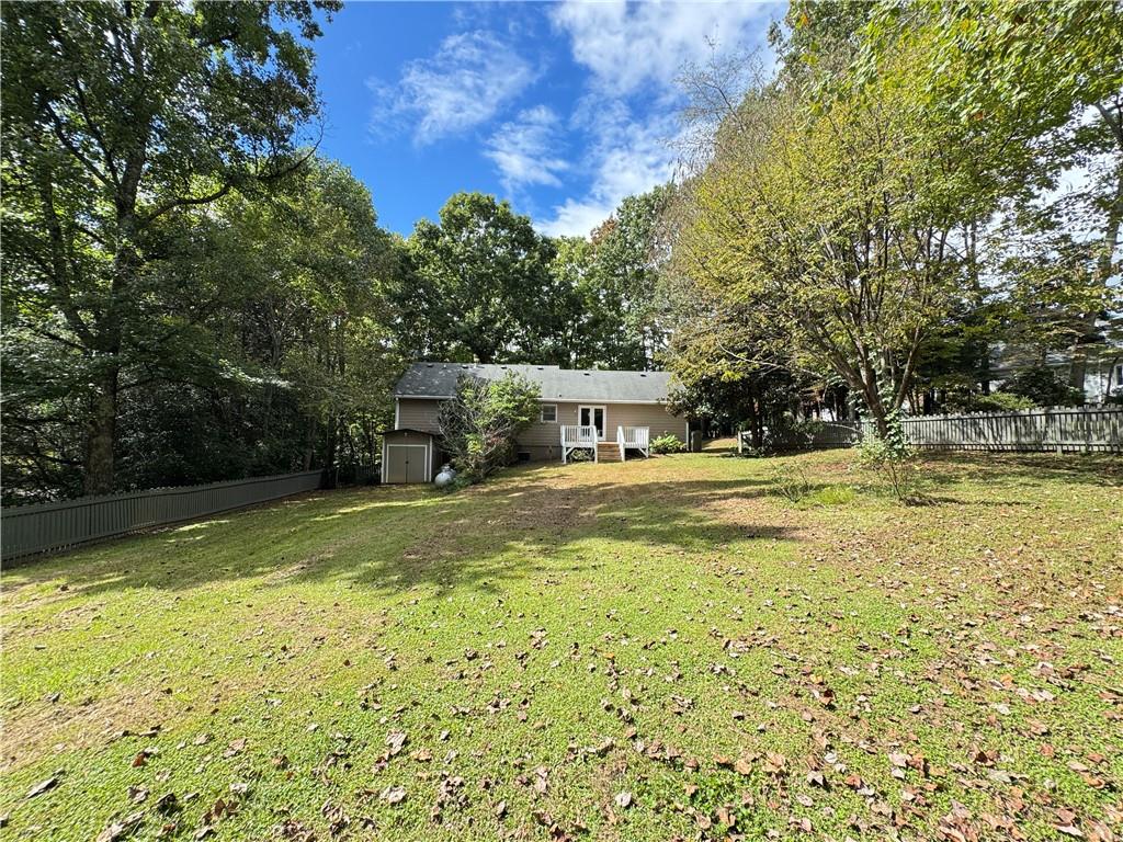 71 Emerald Lane Jasper, GA 30143 - Photo 20 of 30 a view of a swimming pool with a patio
