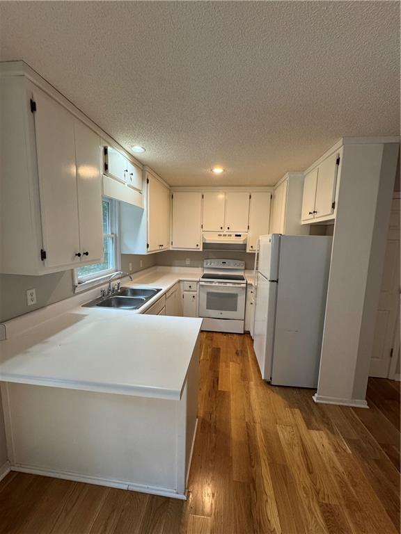 71 Emerald Lane Jasper, GA 30143 - Photo 6 of 30 a kitchen with stainless steel appliances a refrigerator and a stove top oven
