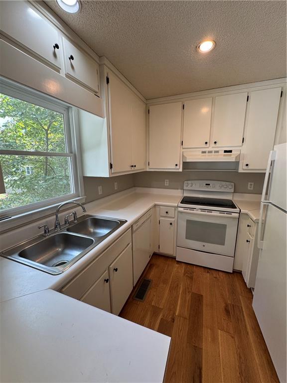 71 Emerald Lane Jasper, GA 30143 - Photo 7 of 30 a kitchen that has a sink cabinets counter space appliances and a window