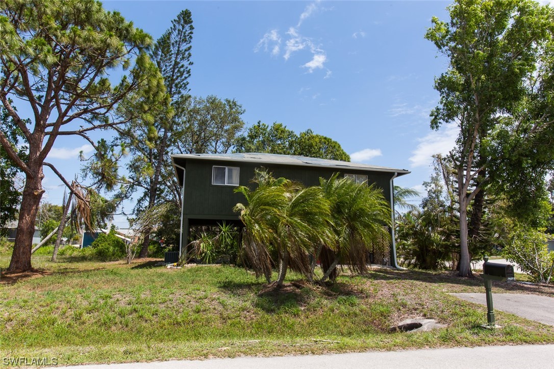 8469 Cardinal Road Fort Myers, FL 33967 - Photo 3 of 44 a view of a backyard