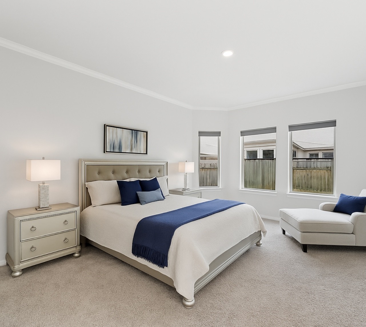 1711 Country Air Lane Missouri City, TX 77459 - Photo 16 of 29 a spacious bedroom with a bed a couch and a window