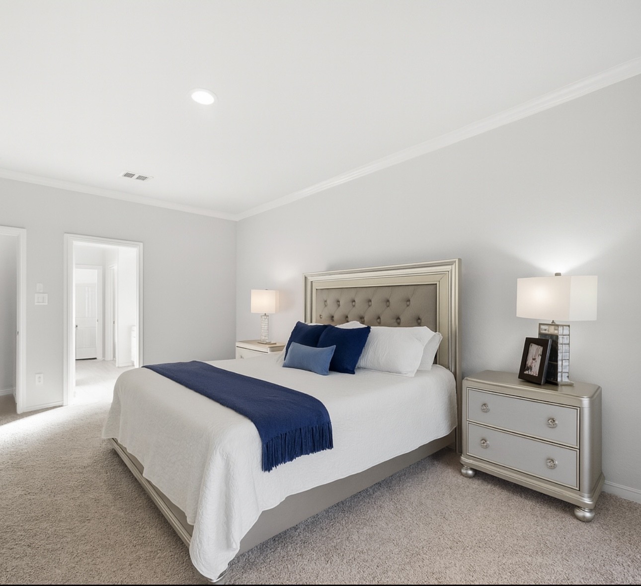 1711 Country Air Lane Missouri City, TX 77459 - Photo 17 of 29 a bedroom with a bed and a night stand