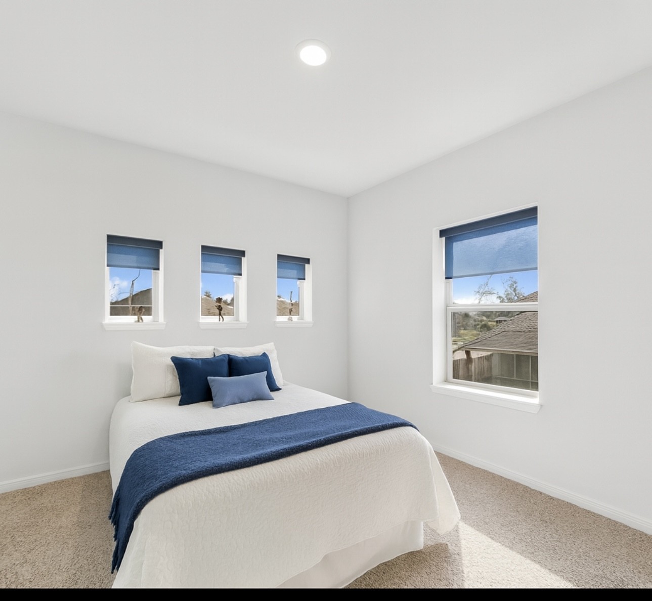 1711 Country Air Lane Missouri City, TX 77459 - Photo 19 of 29 a bedroom with a large bed and a window