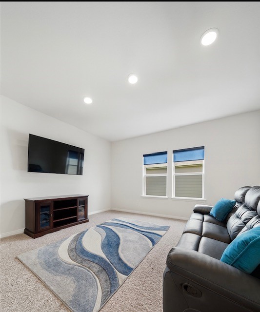 1711 Country Air Lane Missouri City, TX 77459 - Photo 22 of 29 a living room with furniture and a flat screen tv