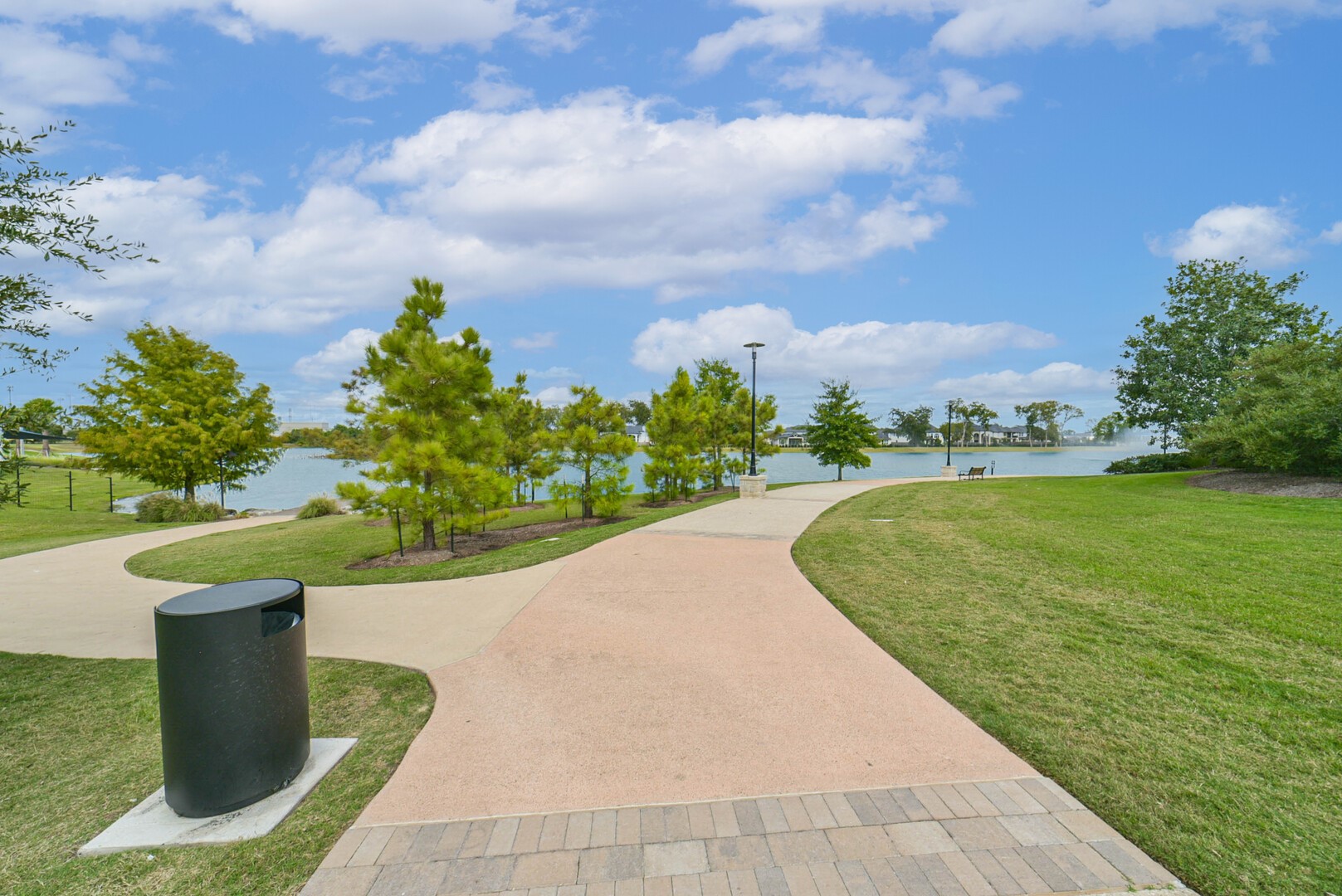 1711 Country Air Lane Missouri City, TX 77459 - Photo 29 of 29 a view of a garden with a fountain