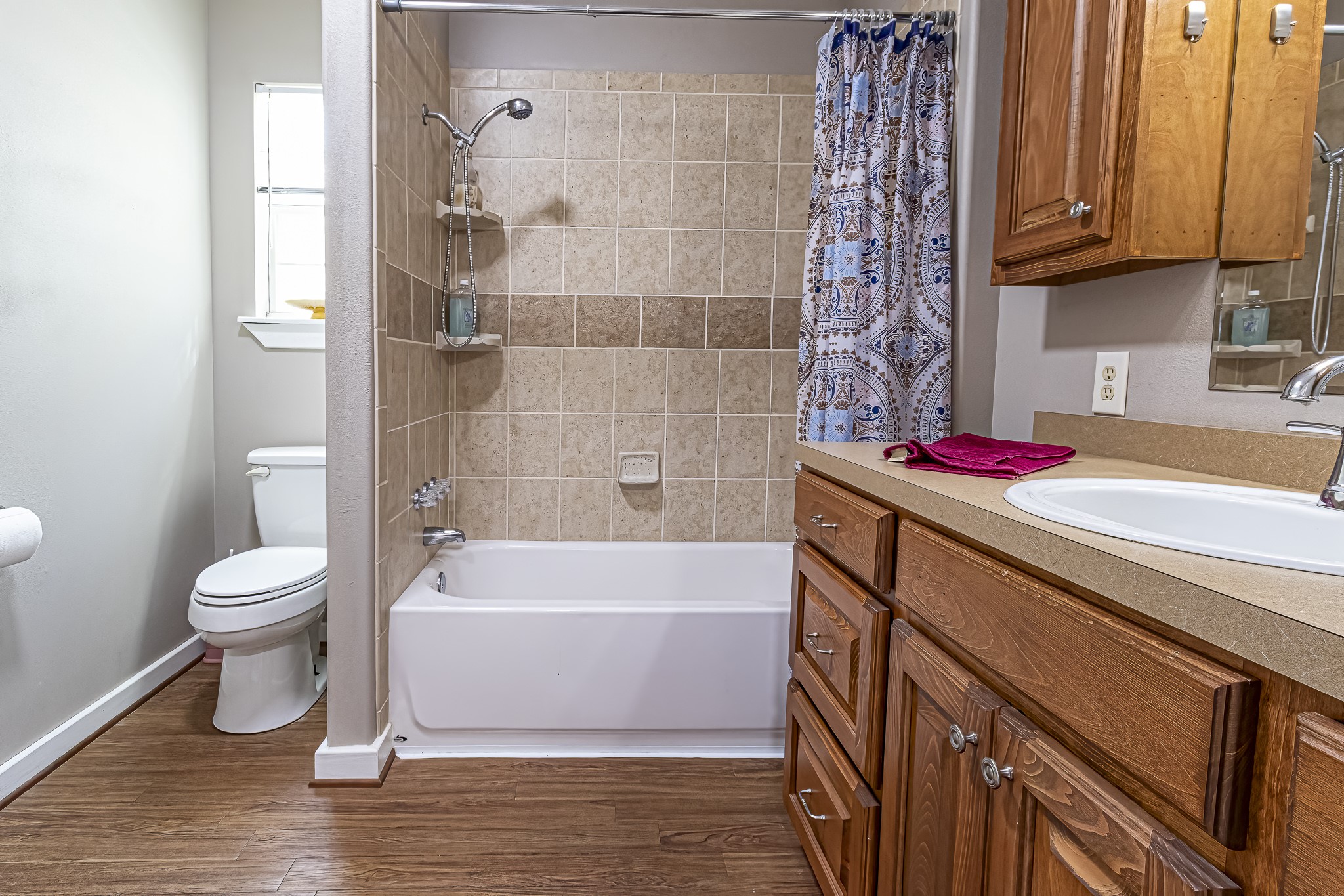 188 Pullin Road Corrigan, TX 75939 - Photo 23 of 50 a bathroom with a sink a toilet and bathtub