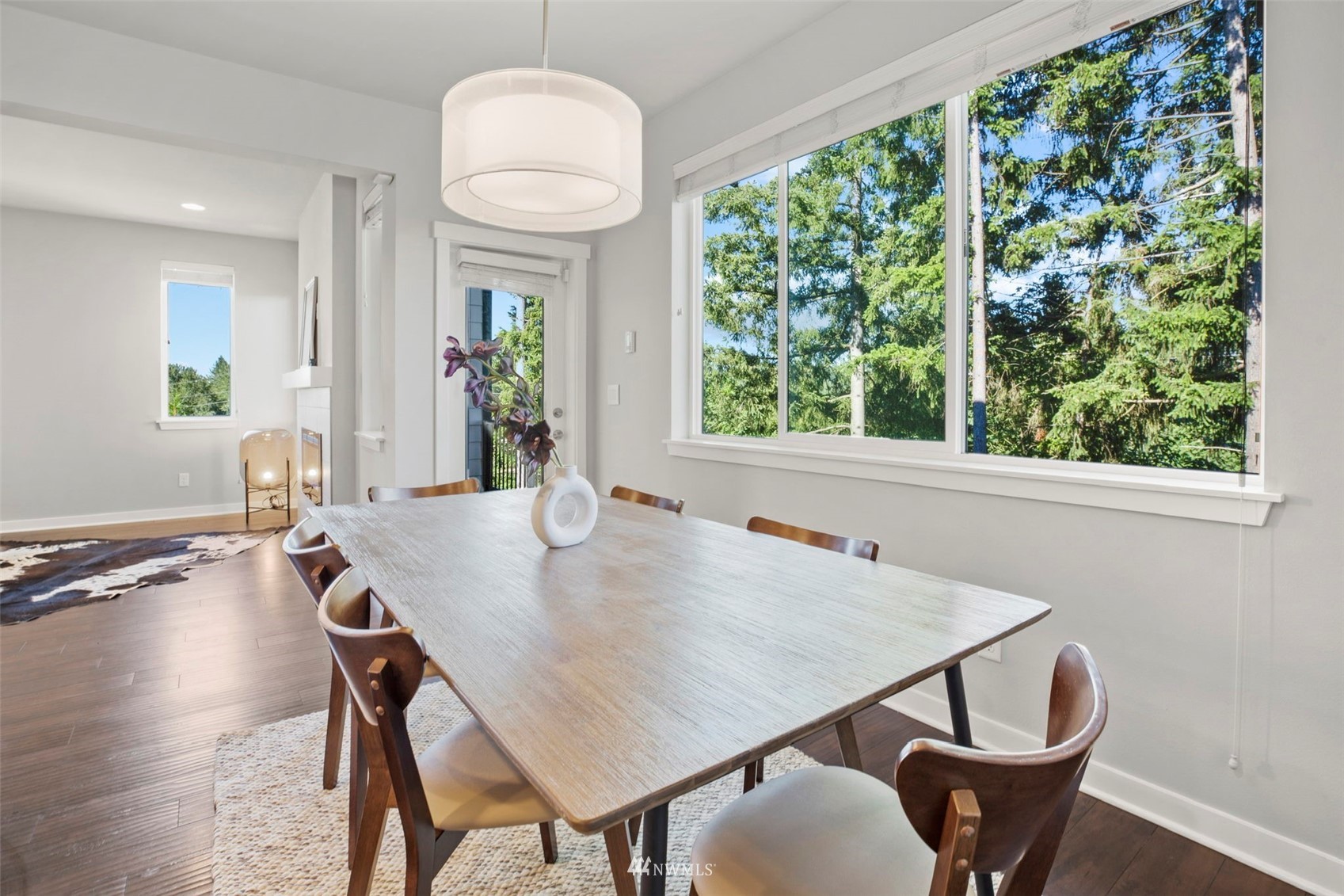 1325 Seattle Hill Road, Unit F1 Bothell, WA 98012 - Photo 13 of 34 a view of a dining room with furniture window and wooden floor