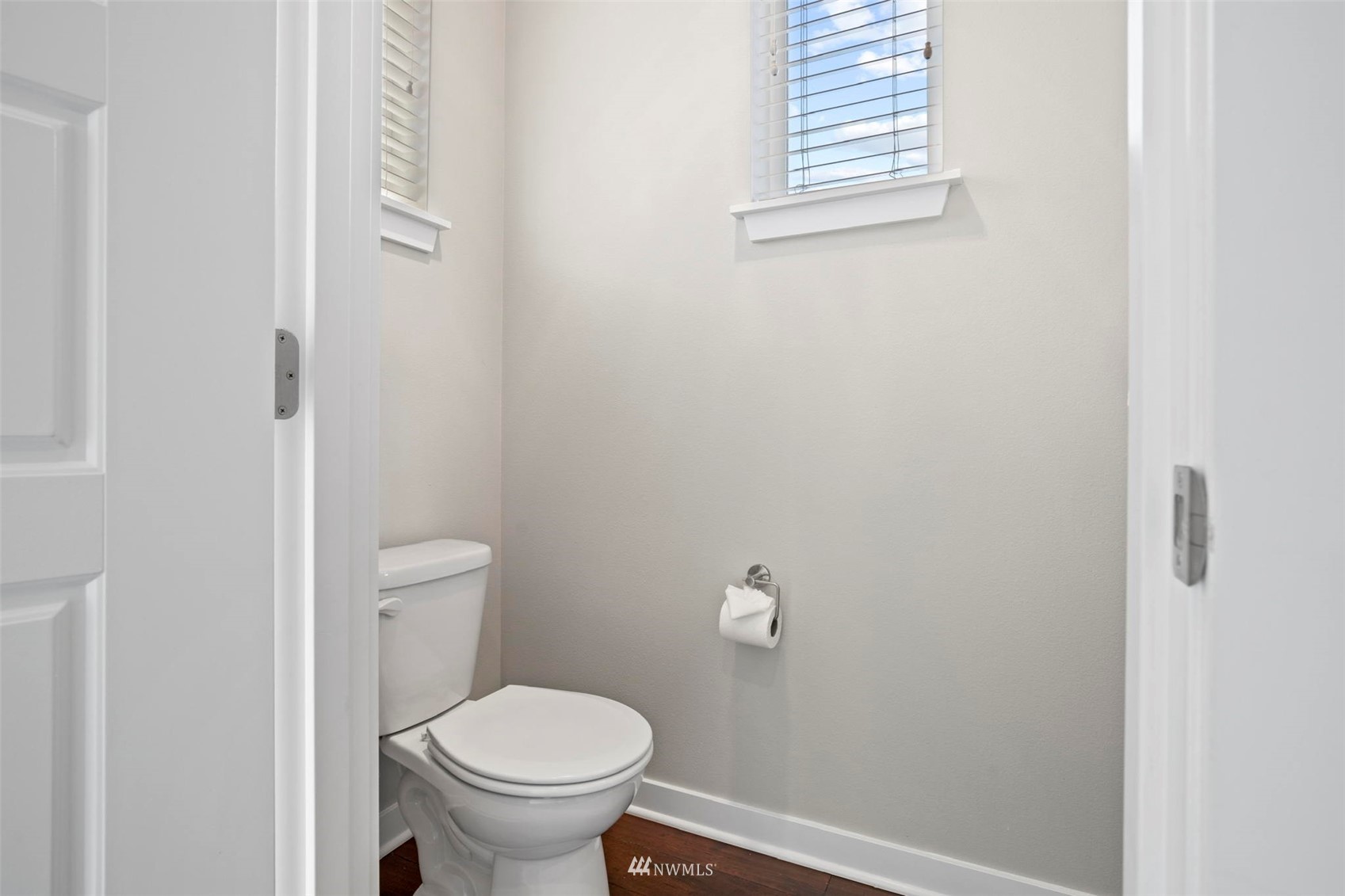 1325 Seattle Hill Road, Unit F1 Bothell, WA 98012 - Photo 15 of 34 a white toilet sitting next to a small bathroom