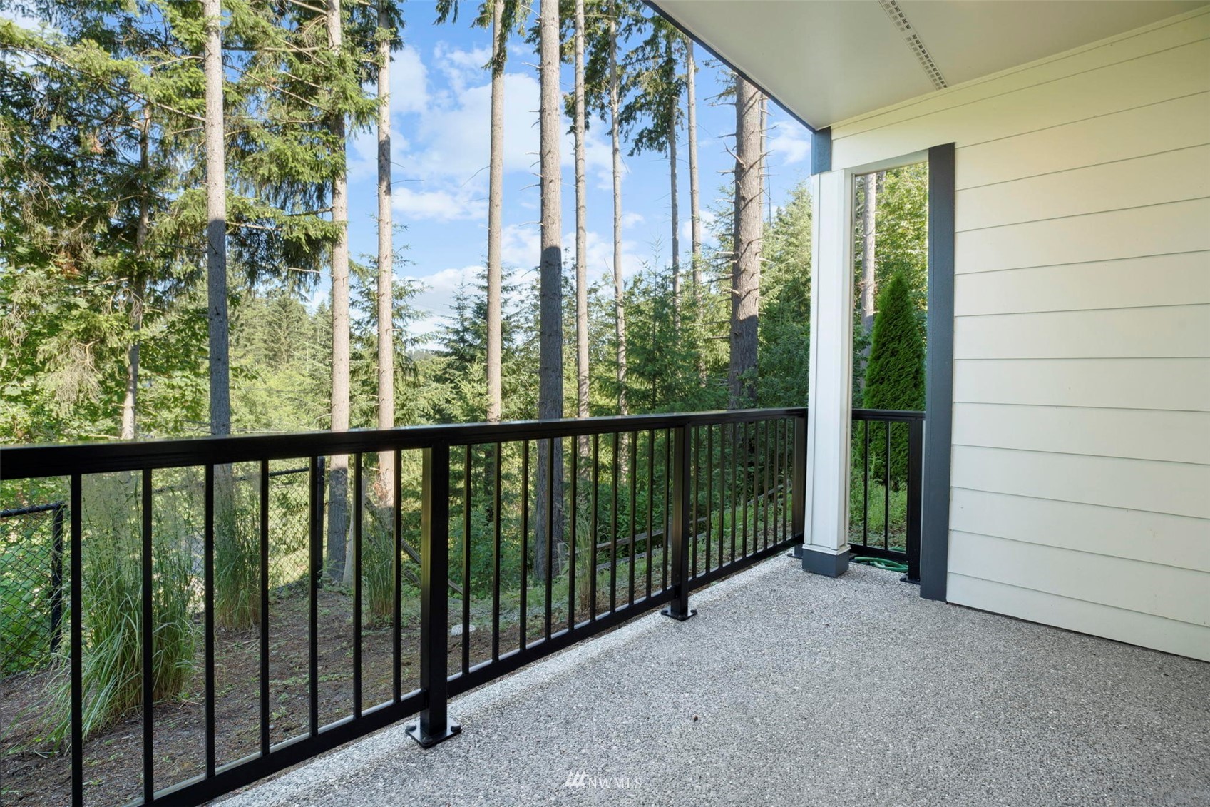 1325 Seattle Hill Road, Unit F1 Bothell, WA 98012 - Photo 33 of 34 a view of a balcony with an outdoor space