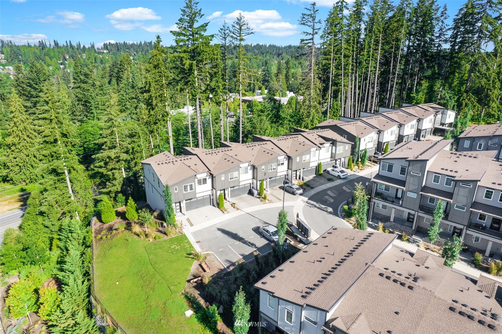 1325 Seattle Hill Road, Unit F1 Bothell, WA 98012 - Photo 34 of 34 an aerial view of a house with a yard basket ball court and outdoor seating