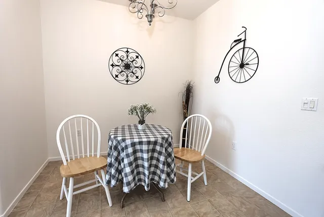 a kitchen with stainless steel appliances a sink stove and cabinets