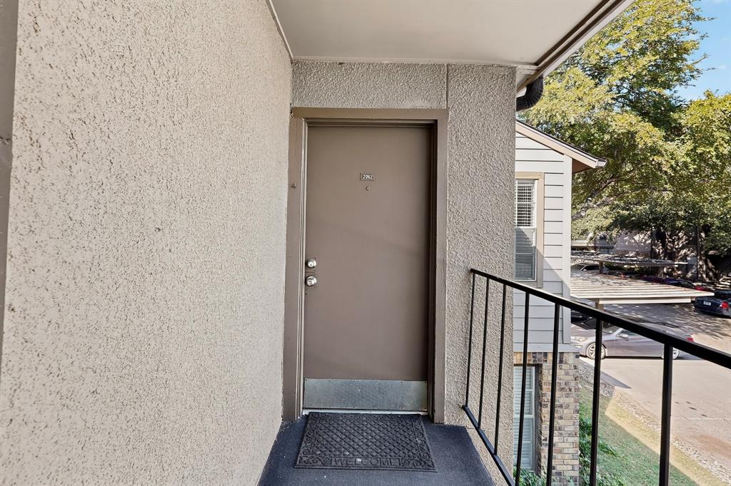 5300 Keller Springs Road, Unit 2062 Dallas, TX 75248 - Photo 3 of 27 a view of a balcony