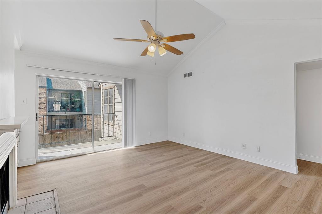 5300 Keller Springs Road, Unit 2062 Dallas, TX 75248 - Photo 5 of 27 a view of an empty room with a window