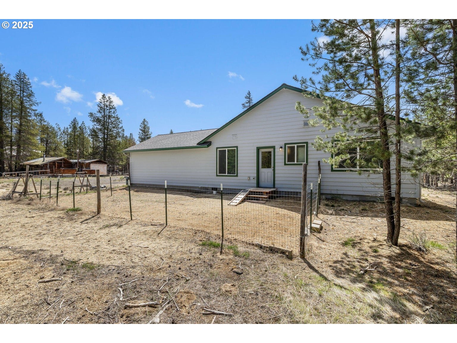 11421 Burlwood Road La Pine, OR 97739 - Photo 25 of 31 a house view with a backyard space