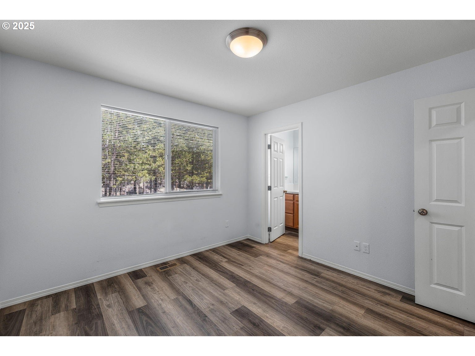 11421 Burlwood Road La Pine, OR 97739 - Photo 9 of 31 a view of an empty room with closet and window