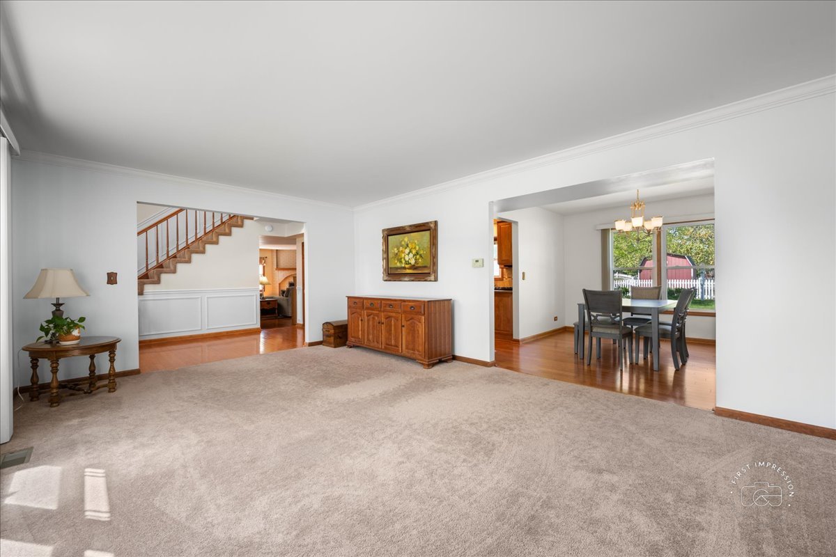 375 Hunter Drive Carol Stream, IL 60188 - Photo 12 of 20 a view of a livingroom with furniture and a flat screen tv