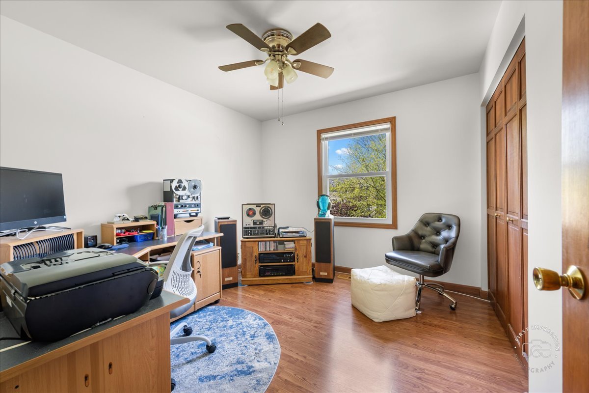375 Hunter Drive Carol Stream, IL 60188 - Photo 18 of 20 a view of a workspace with furniture and a window