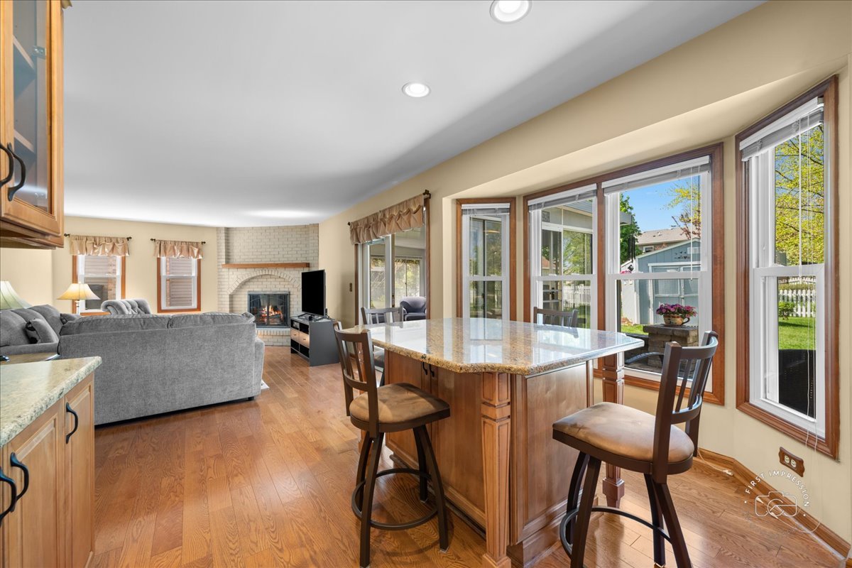 375 Hunter Drive Carol Stream, IL 60188 - Photo 6 of 20 a living room with furniture and a large window