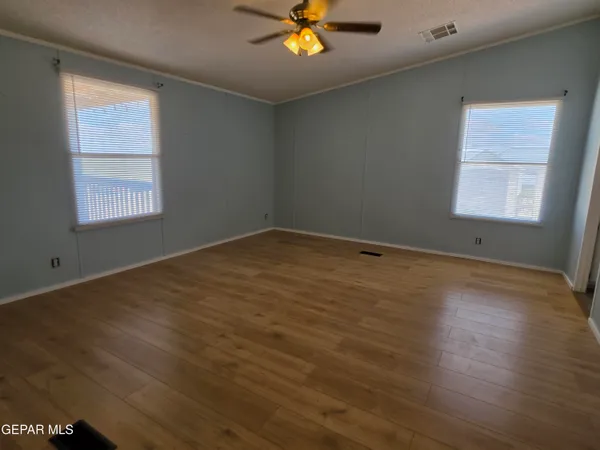 a view of a room with racks on the wall