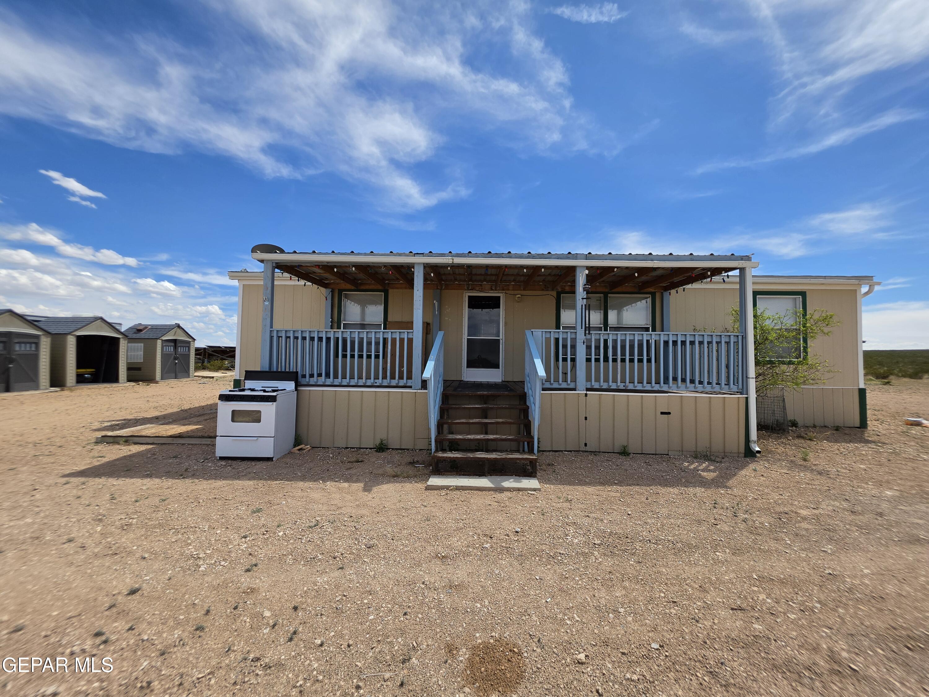 101 Clydesdale Road Dell City, TX 79847 - Photo 8 of 90 a view of a house with a backyard