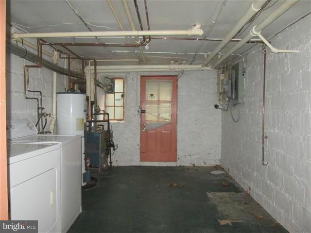 3711 Rexmere Road Baltimore, MD 21218 - Photo 22 of 23 a room with storage and utility
