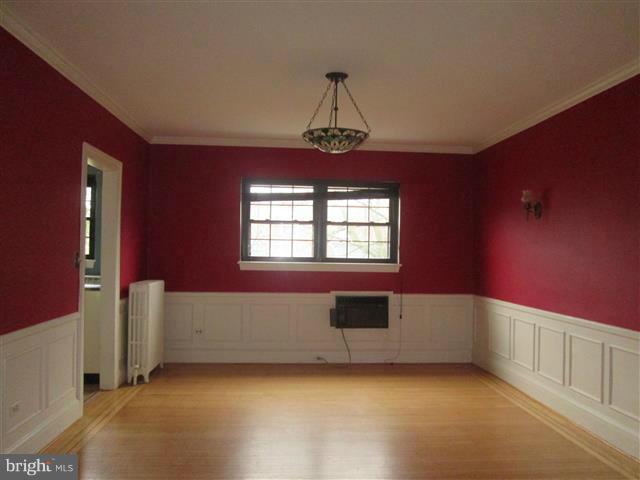 3711 Rexmere Road Baltimore, MD 21218 - Photo 5 of 23 a view of an empty room with window