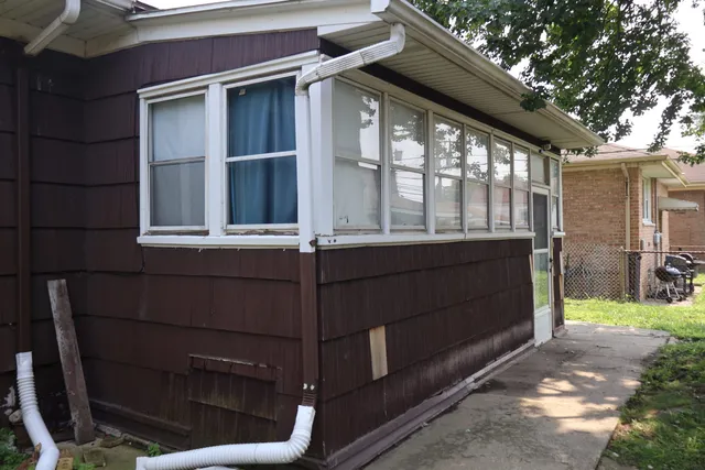 a view of a house with a large window
