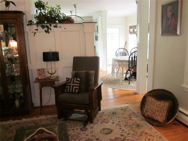 19 Putnam Road Ipswich, MA 01938 - Photo 4 of 13 a living room with furniture and a mirror