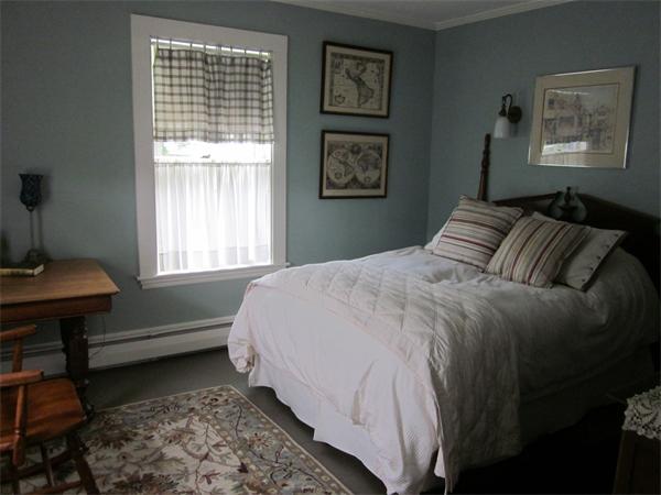 19 Putnam Road Ipswich, MA 01938 - Photo 5 of 13 a bedroom with a bed and a window