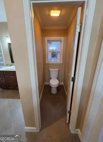 a bathroom with a sink and a toilet