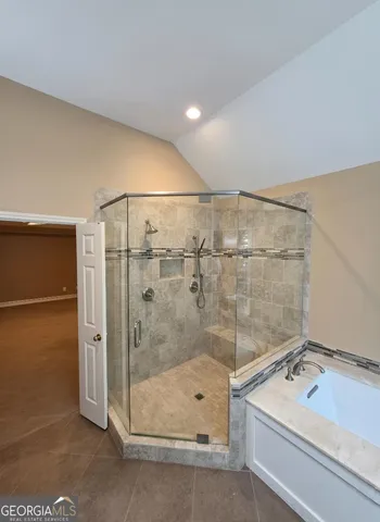 a bathroom with a sink and a shower
