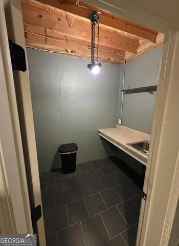 a bathroom with a sink and a toilet