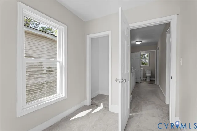 a view of a room that has a window in it