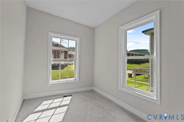 an empty room that has a window