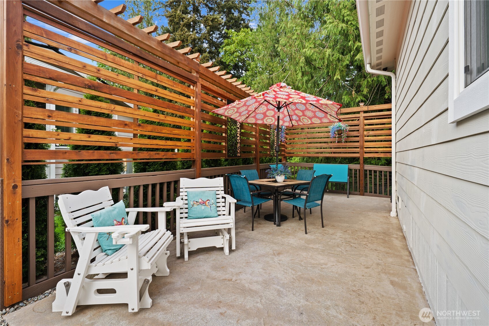 23825 15th Avenue Southeast, Unit 427 Bothell, WA 98021 - Photo 16 of 38 a balcony with table and chairs